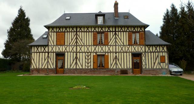 A timber-framed house that was built in the 18th century. It stands in Morsan, Eure, France.