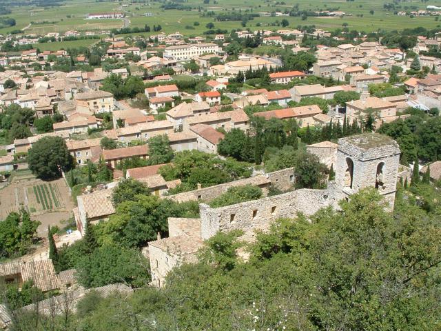 Saint-Victor-la-Coste, Gard, France, with the ruins of the medieval church in the foreground. Photo taken taken by me, Donald Albury, in…