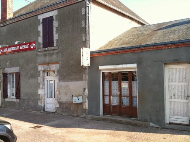 inconspicuous local shop sells bread etc