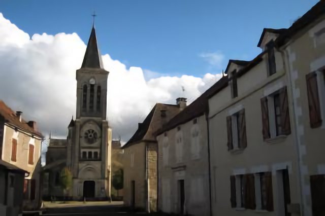 The centre of the village Degagnac (Lot) and its characteristic church in Gotic style