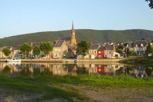 Fumay across the river, from the north, near the bridge to Haybes, taken by David Edgar in the evening on 2005-09-03.