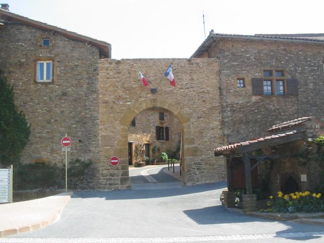 Picture by Barbara Walter. The entrance arch from the french medieval village Oingt, Beaujolais.