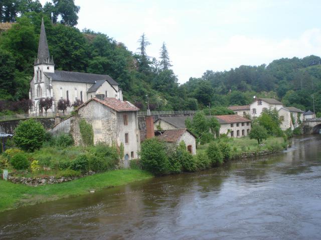 Vienne river and church Pont-de-Noblat (Haute-Vienne, Fr).